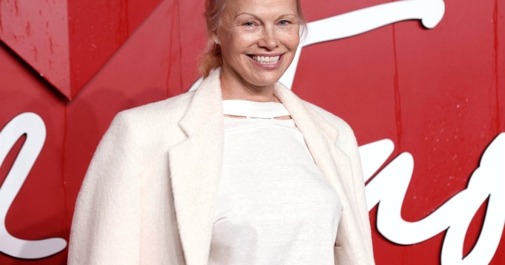 Pamela Anderson thought no one would notice she wasn't wearing makeup.  "I feel much more sensual in my own skin"