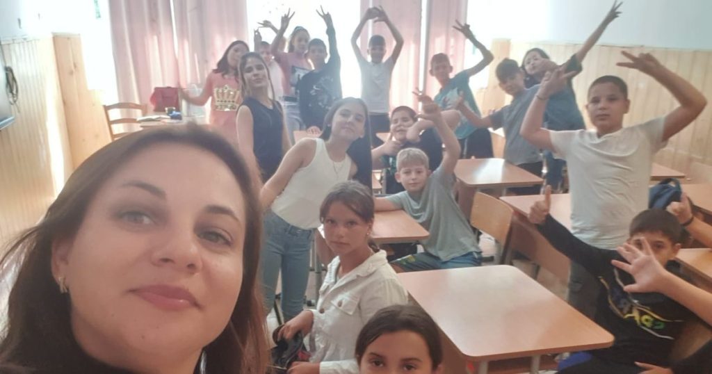 The teacher who buys the students supplies, clothes and food so they don't drop out of school.  "Ma'am We Love You"