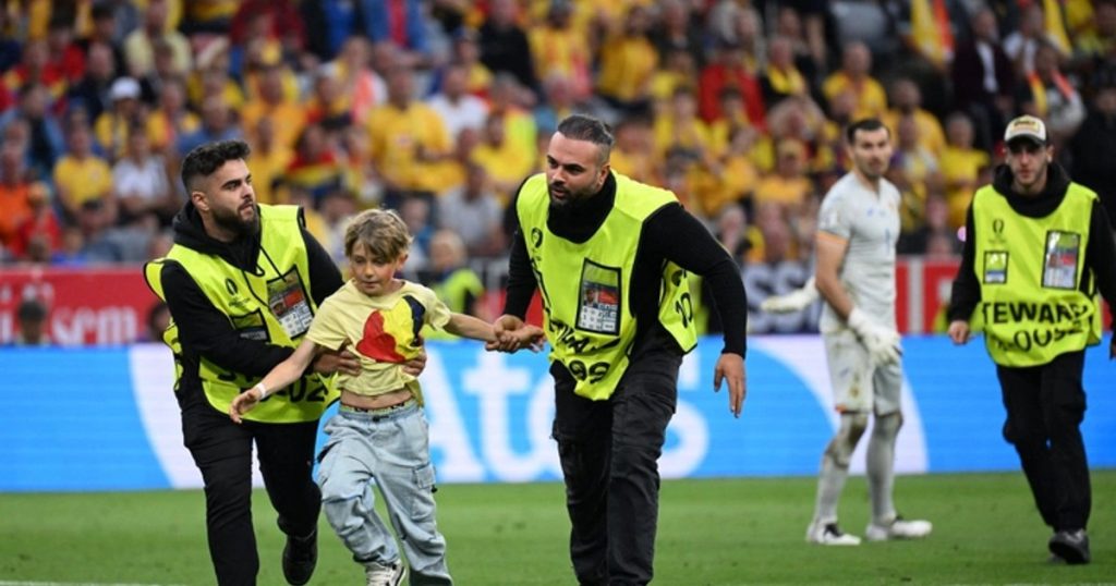 Why did the Romanian kid who was chased by the stewards enter the field during the match with the Netherlands.  "I made it" PHOTO