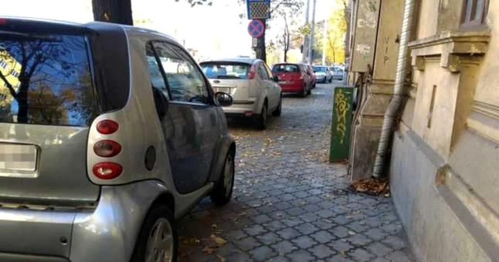 The sidewalk in front of the house, cause of dispute for parking between owners and drivers. Who is right