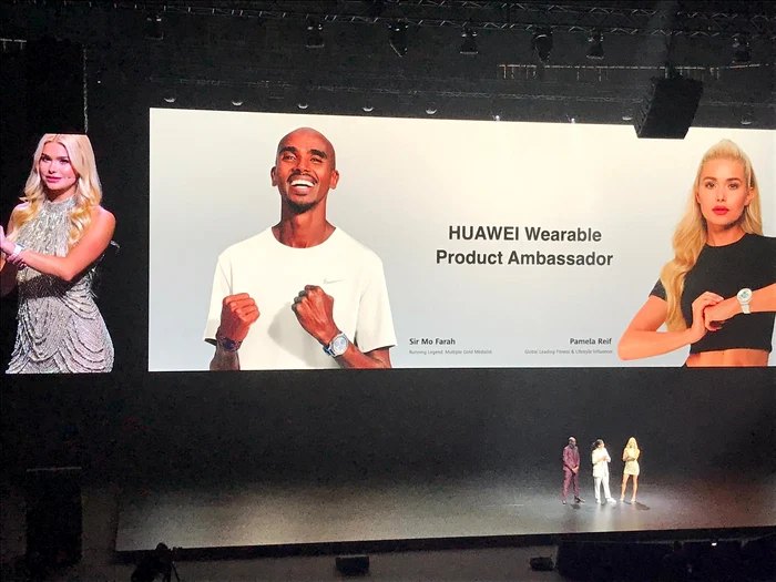 Pamela Reif and Sir Mo Farah, Huawei ambassadors, on stage at Palau Sant Jordi. Huawei PHOTO