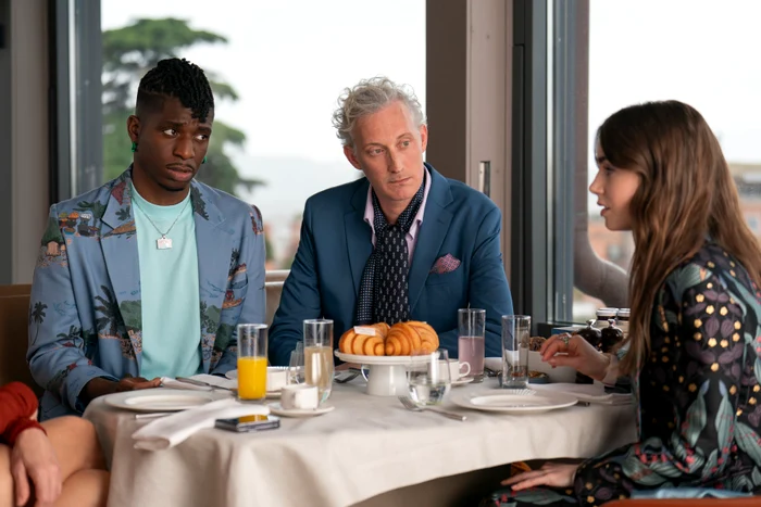 Luc, Julien and Emily, colleagues at the Grateau agency. PHOTO: Netflix