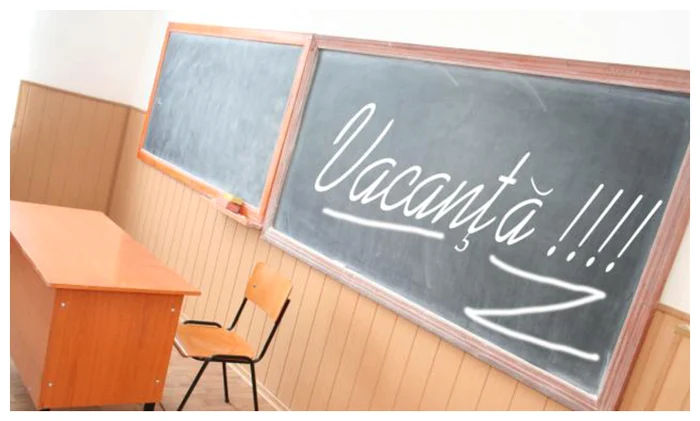 The word holiday written on a blackboard