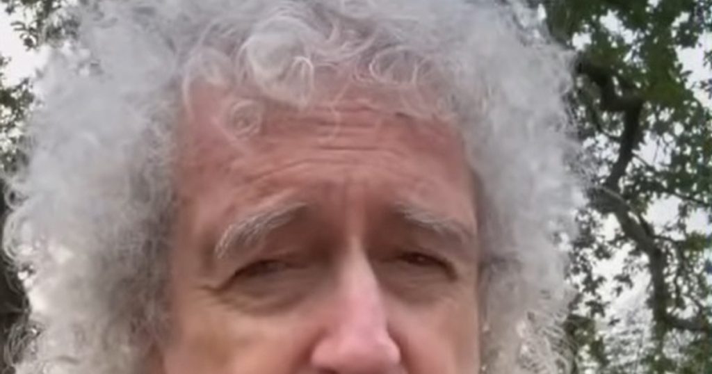 Video Queen guitarist Brian May suffered a stroke that paralyzed his left hand. "It was a bit scary"