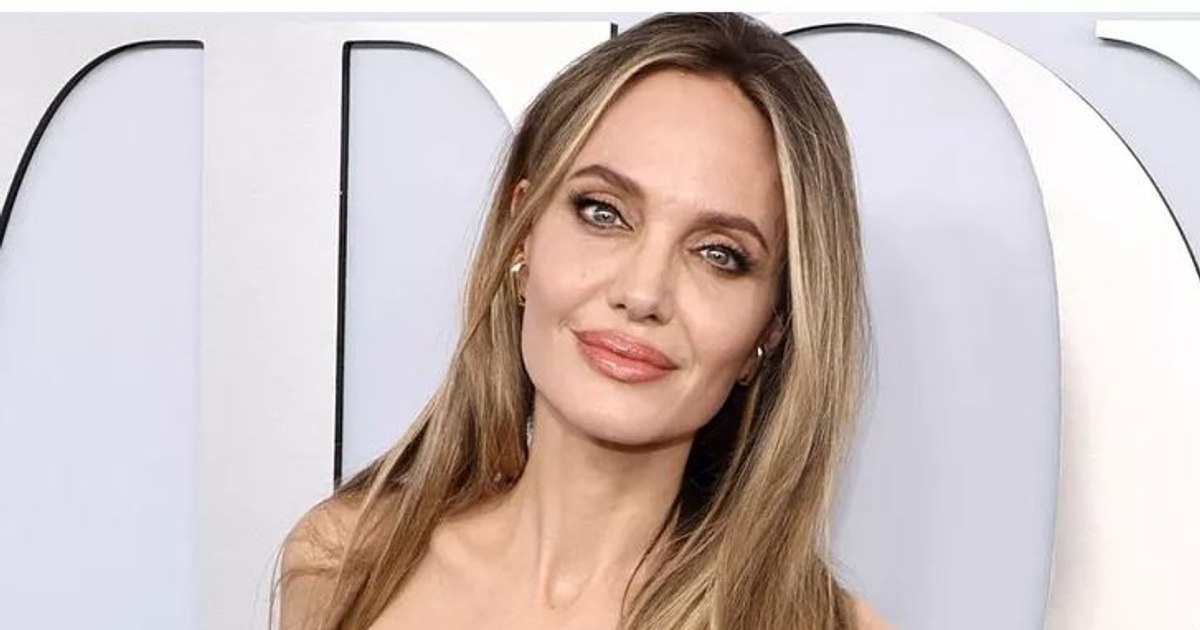 Photo Angelina Jolie and her alleged "boyfriend", captured at an event. They have been seen in public several times