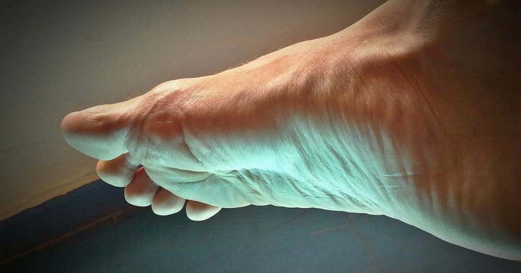 A man who complained about the weakness of the foot learned that he had a small brain. What is the explanation of neurologists