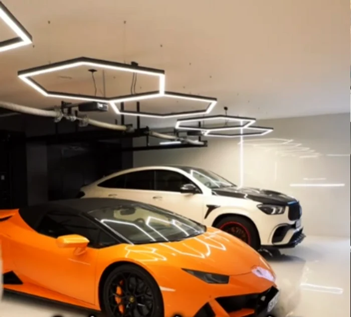 Owner's bolids are parked in a luxurious garage