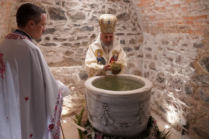 The healing spring water is offered to the Photo believers: Archdiocese of the Lower Danube