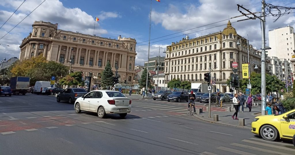 How is Romania promoted on one of the largest airports in the world by a great French writer