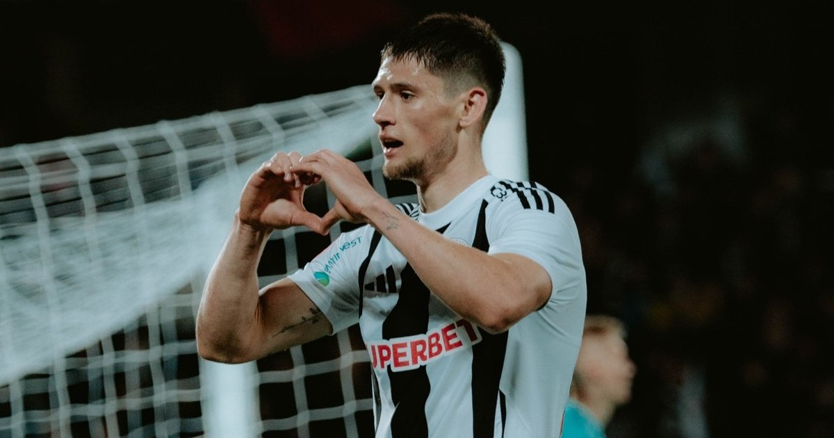 Neluțu Sabău beats him where Dan Petrescu catches. CFR Cluj, given down from the first place