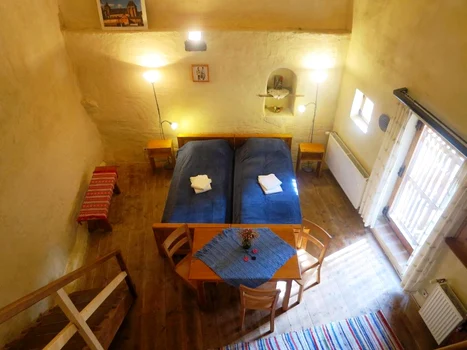 Former chambers and cereal warehouses of the Church in Axente Sever, transformed into small photo apartments: Booking