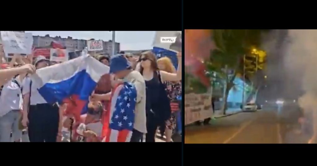 The flag of Russia, burned in Georgia: "Russian pigs, you are not welcome here!"