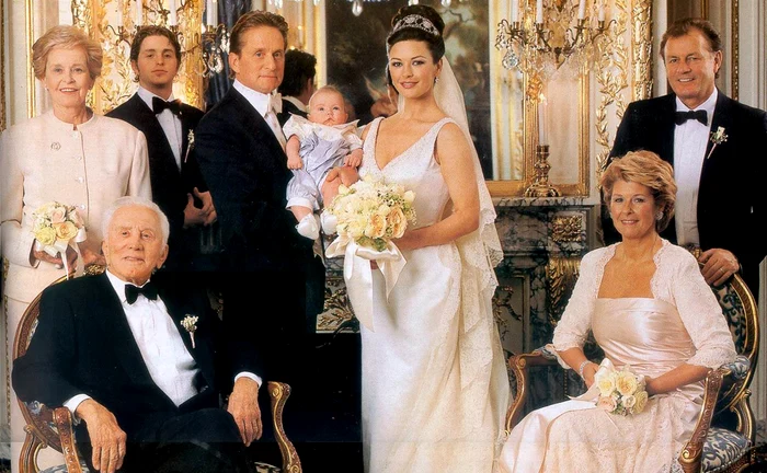 Michael Douglas wedding painting and Catherine Zeta-Jones next to Family Photo Generation Store