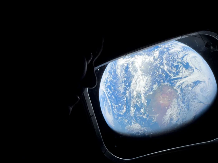 The Blue Planet, through the porthole of the Orion capsule. PHOTO: NASA