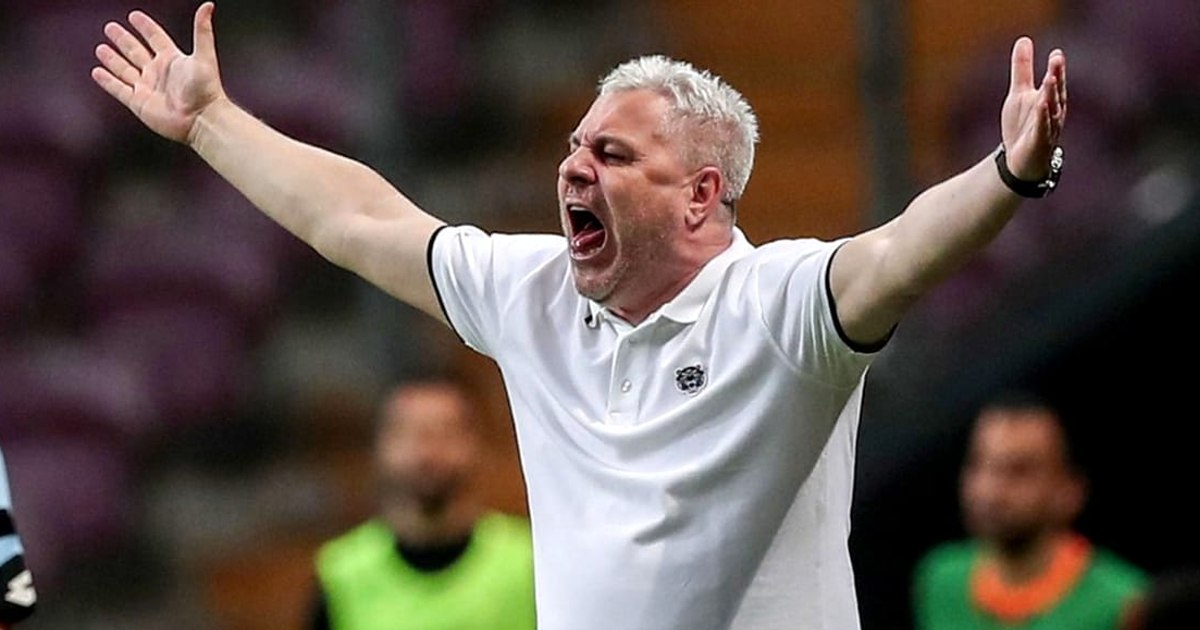 He's slouching like he's in the football gallery at a tennis match. A Bosnian player accuses that he was disturbed by the coach