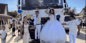 Outrageous images from the wedding of two teenagers, walking down the street on the cab of a truck. “I thought they were dolls… What is this, folks?”
