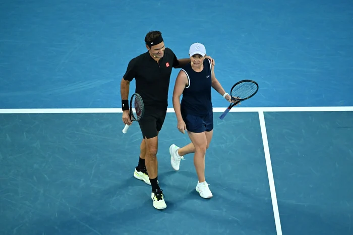 Roger Federer, with Ash Barty at the Opening Ceremony in Melbourne (Photo: EPAImages)