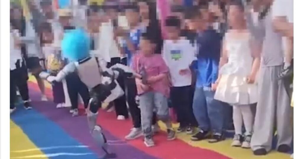 A humanoid robot wearing a clown wig hit a child during a demonstration
