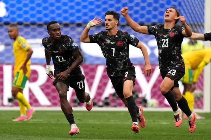 The Canadians celebrate after the goal scored in overtime (Photo: EPAImages)