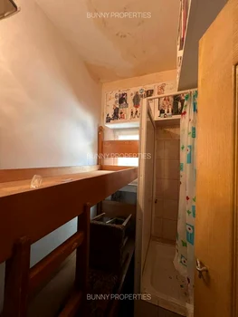 A studio that barely fits a bed, put up for sale Photo: Imobiliare.ro